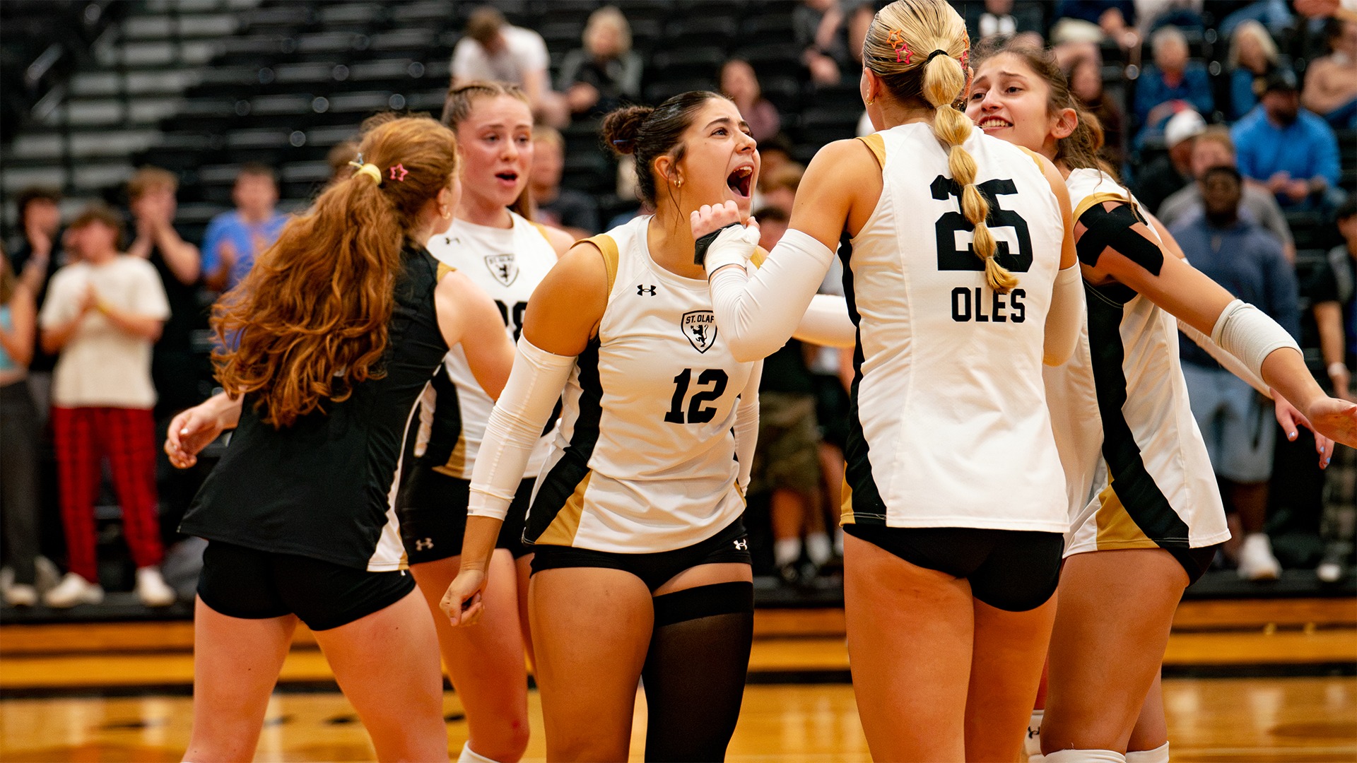 Kailani Schroeder celebrates after winning a point.
