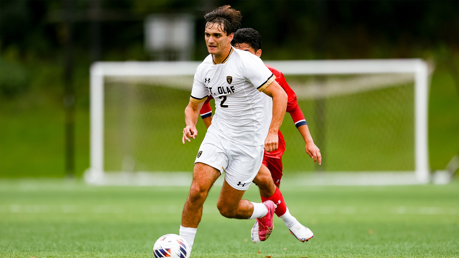 Mateo Ormaza dribbles away from a defender.
