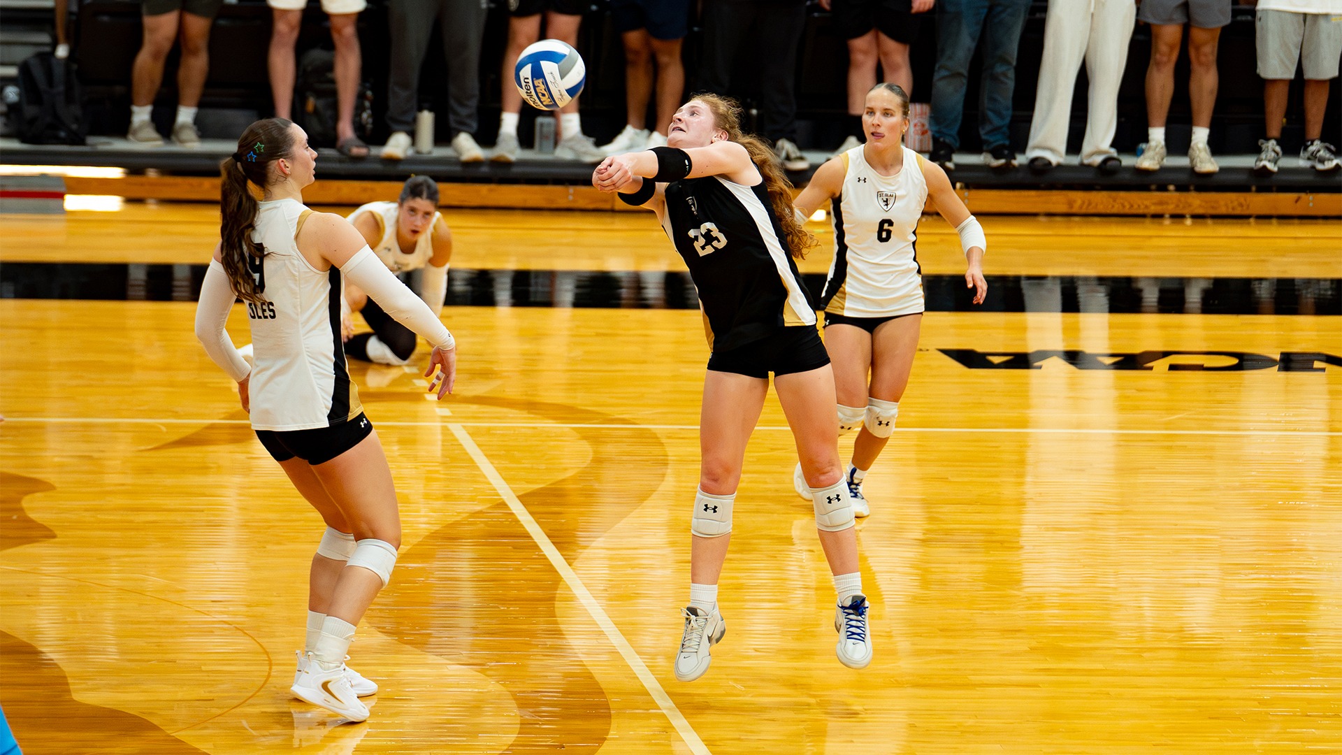 Michaela Dooley bump sets the ball.