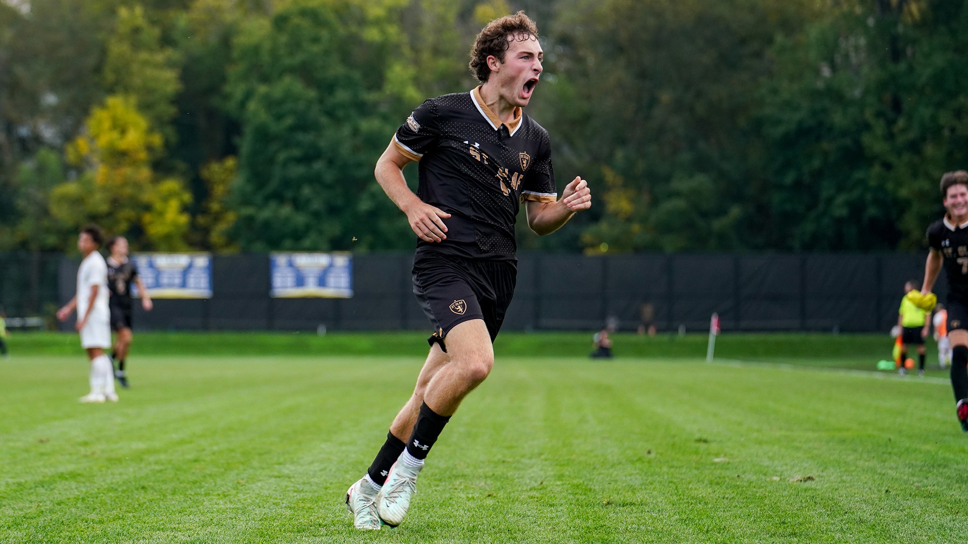 Tustin Todd celebrates his goal against Carleton.