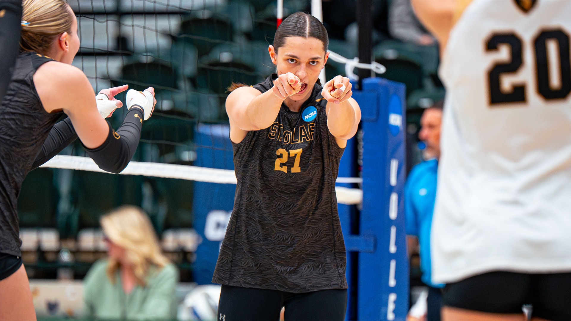 Lilah Van Scoyoc reacts after winning a point.