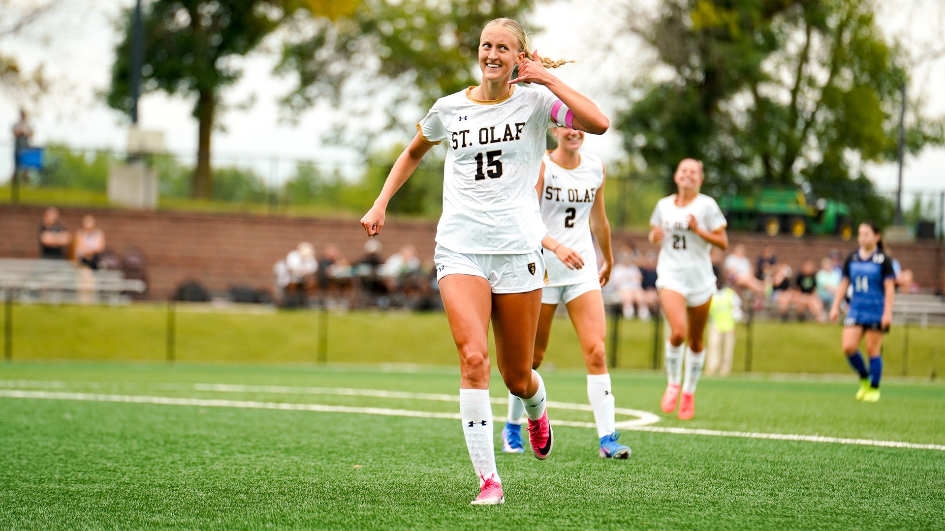 Emily Johnson celebrates her hat trick against Dubuque.