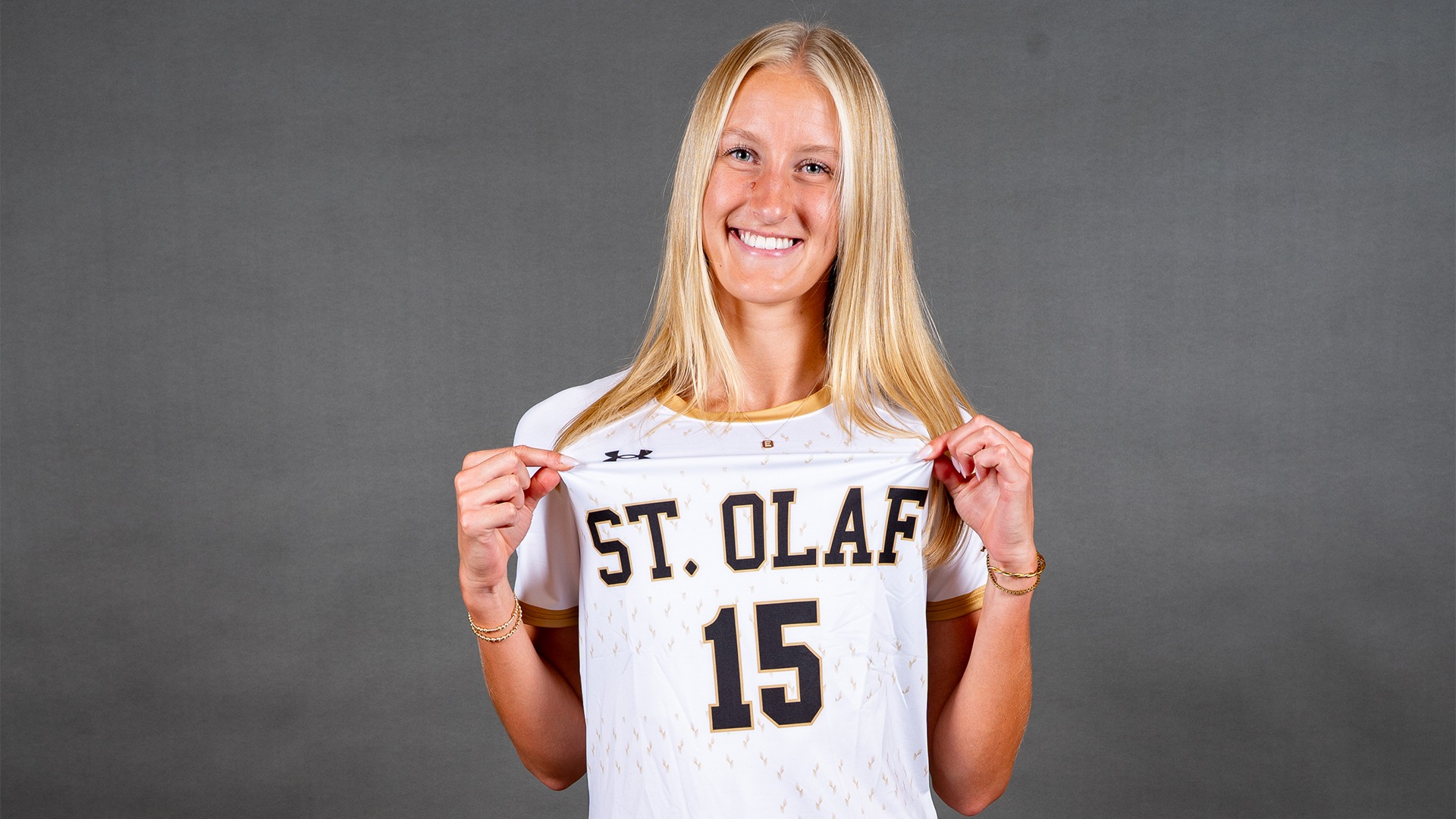Emily Johnson shows off her jersey on photo day.