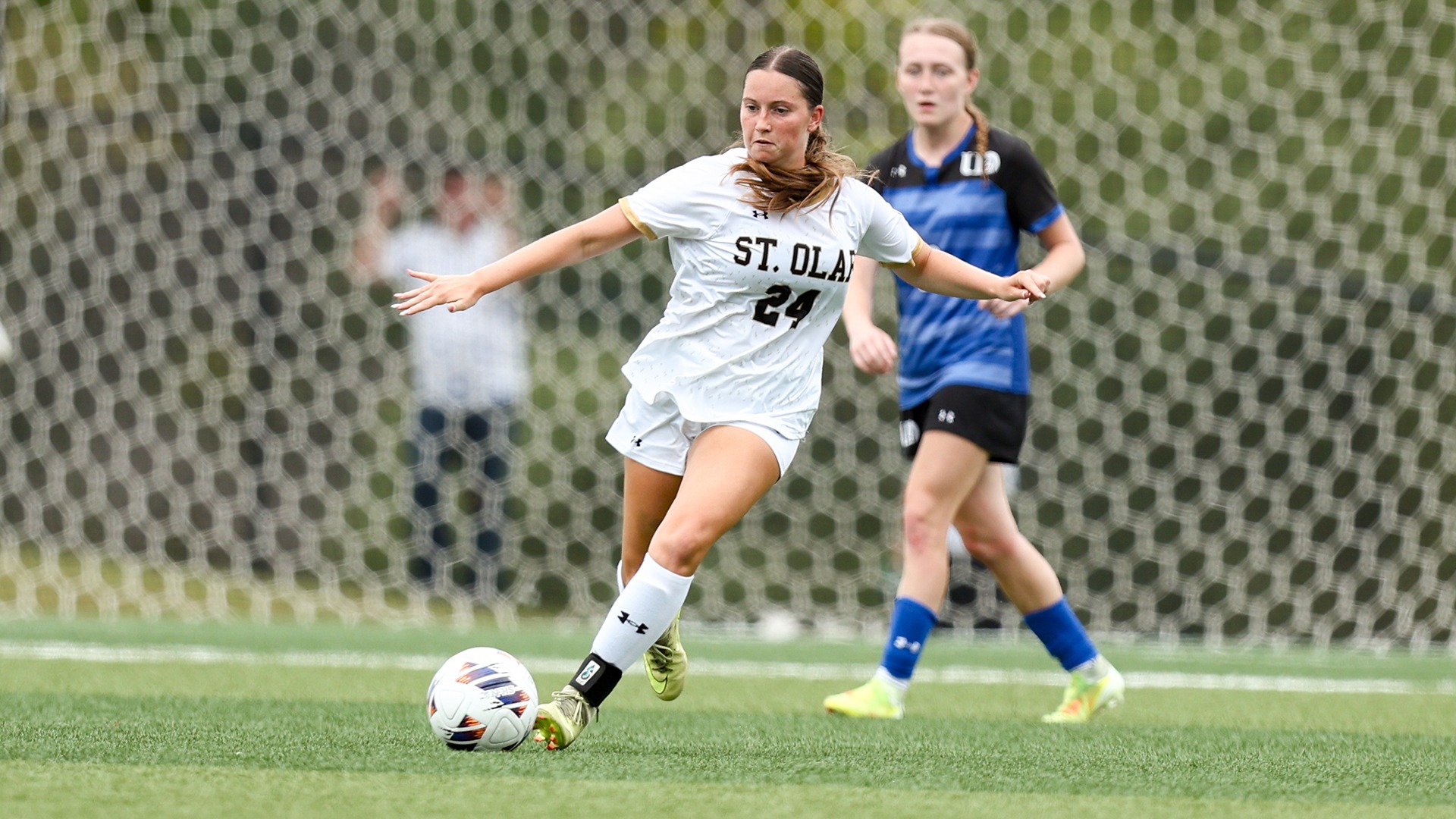 Emmarie Becker clears the ball against Dubuque.