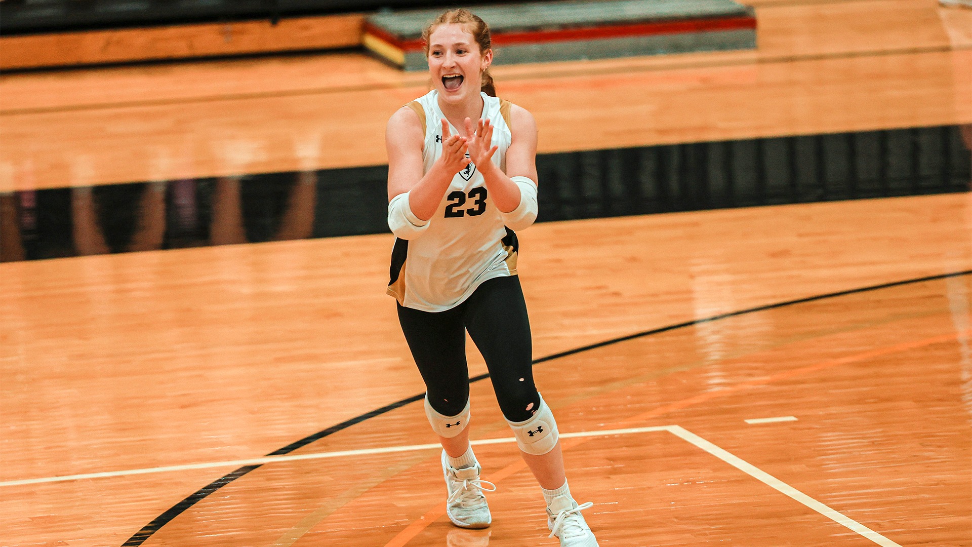 Michaela Dooley celebrates after winning a point.