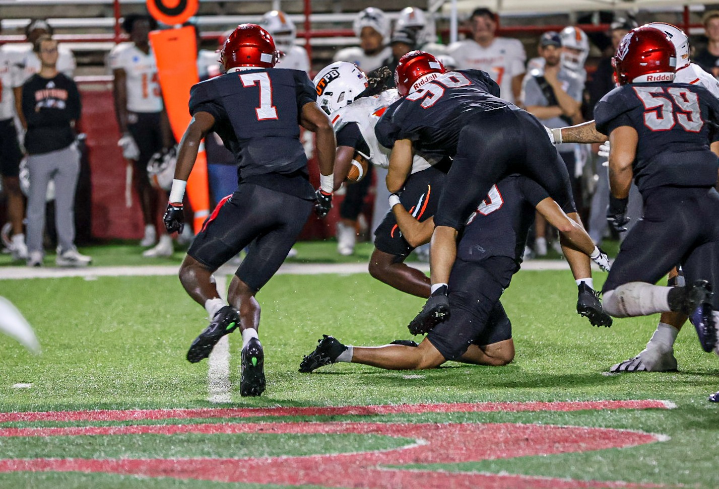 26 FB Lobos stuff the quarterback