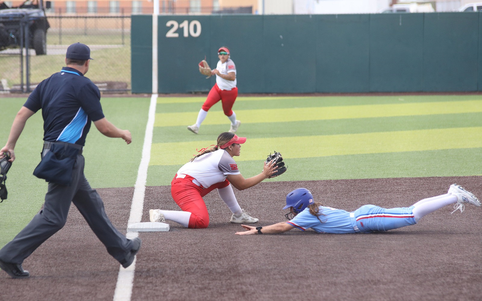 SB 26 Lilliana Cazares looks to get the out at third