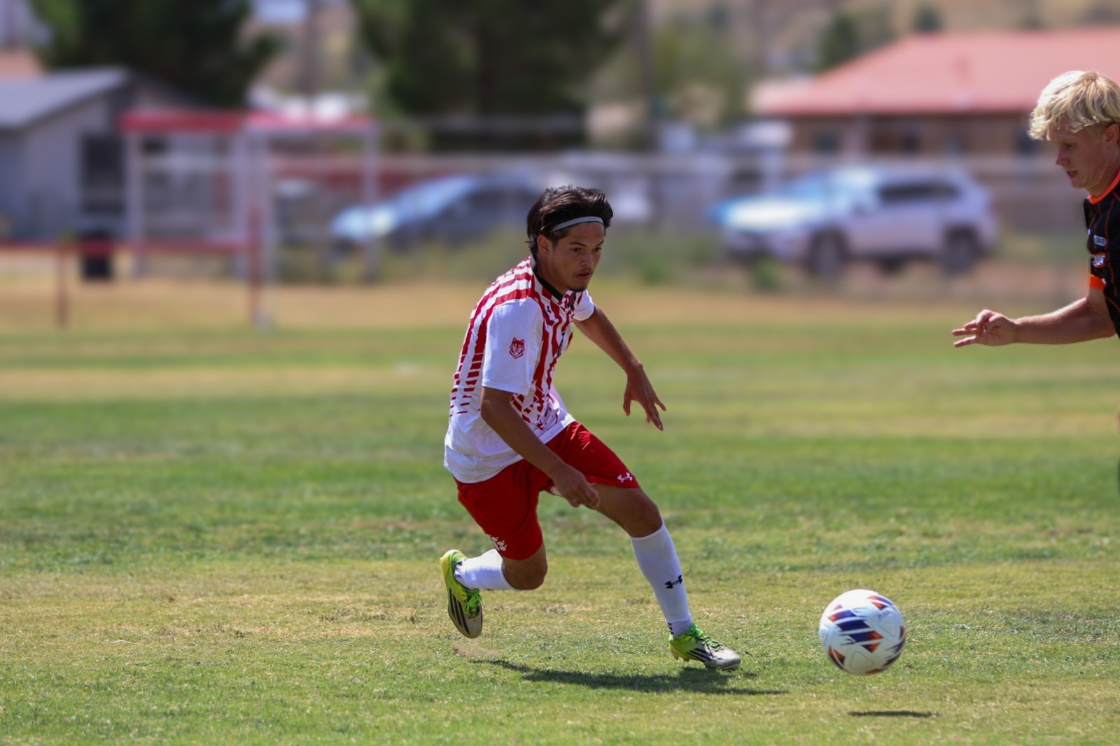 26 MSOC  A Lobo looks to drive down the field
