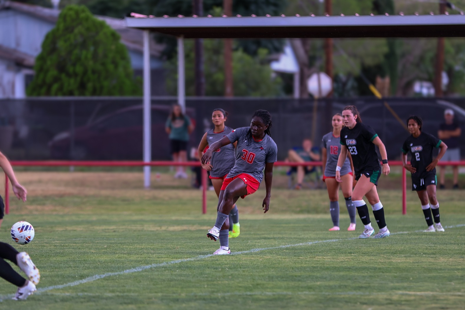 26 WSOC Benedicta Swatson sends the ball flying