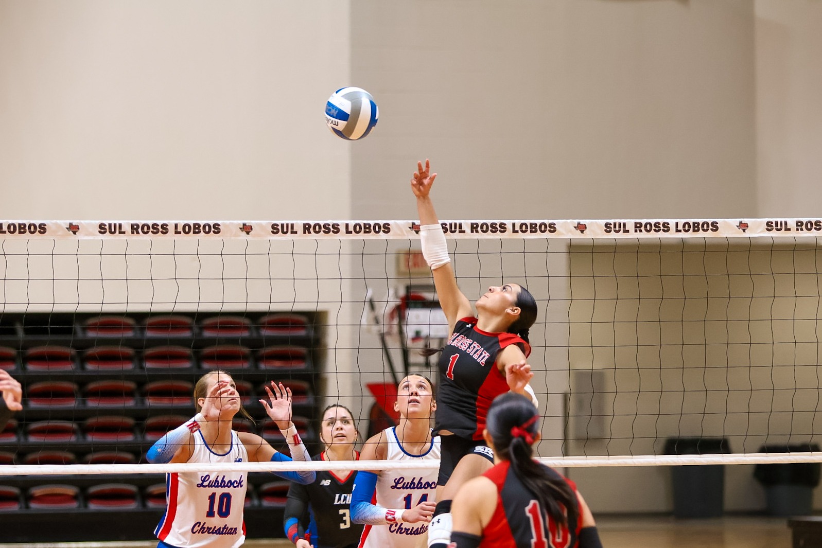 26 VB Violetta Flores defends the net against Lubbock Christian