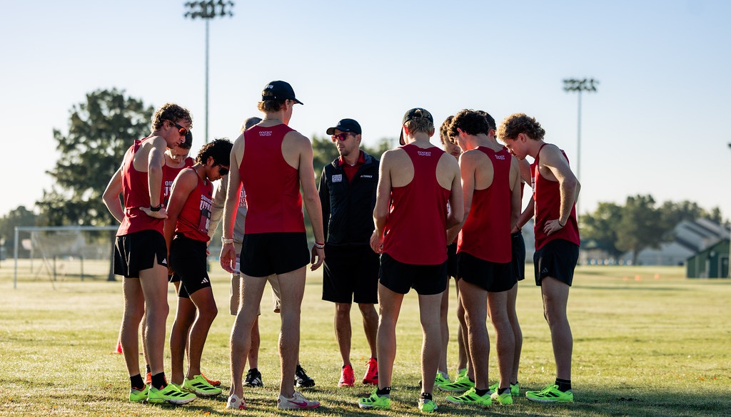 The men's cross country team prepares to race