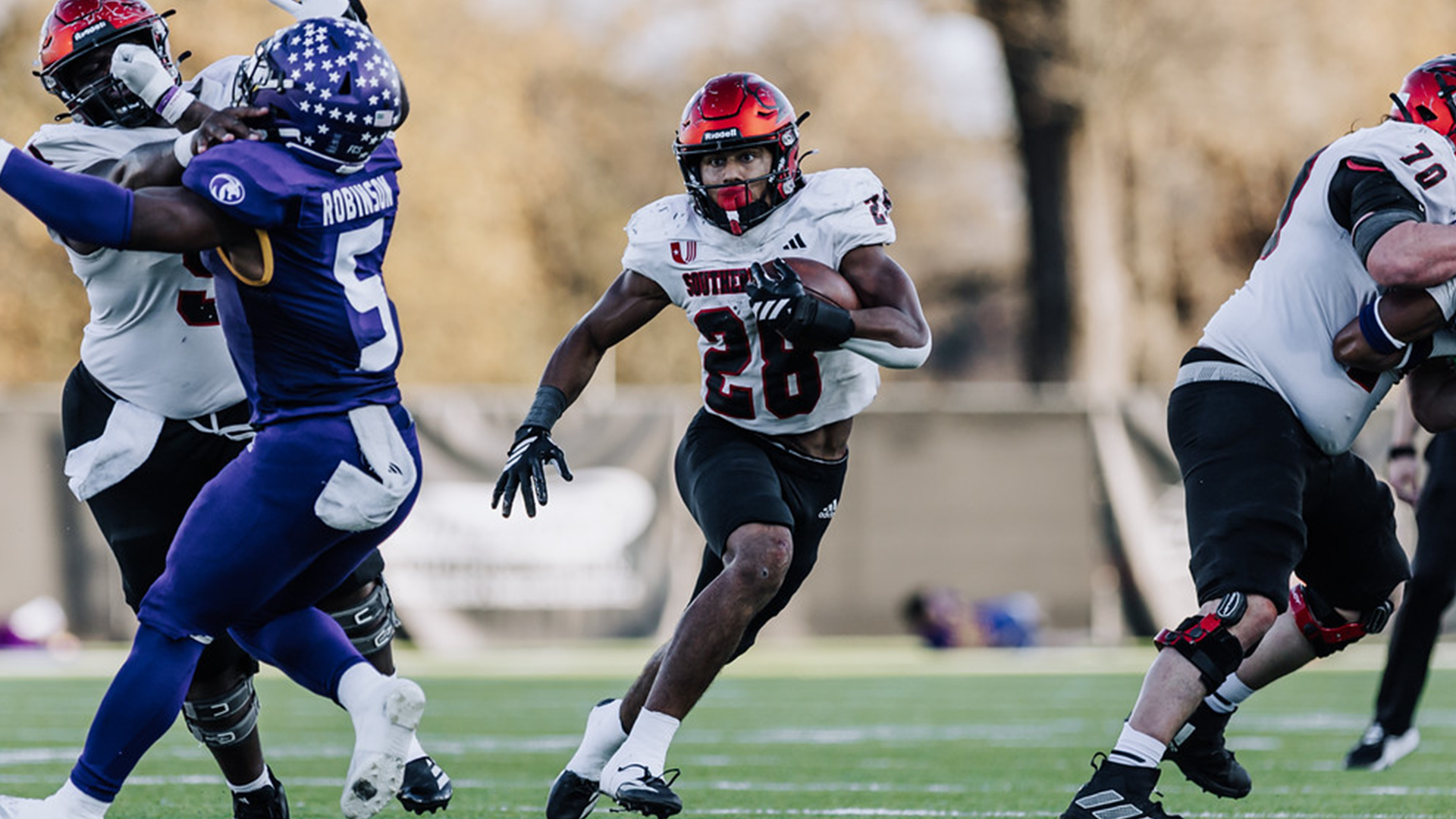 Josh Dye running through the hole
