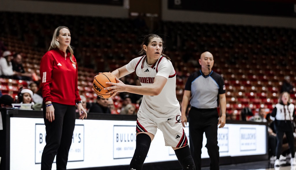 Kortney Doman prepares to pass the ball