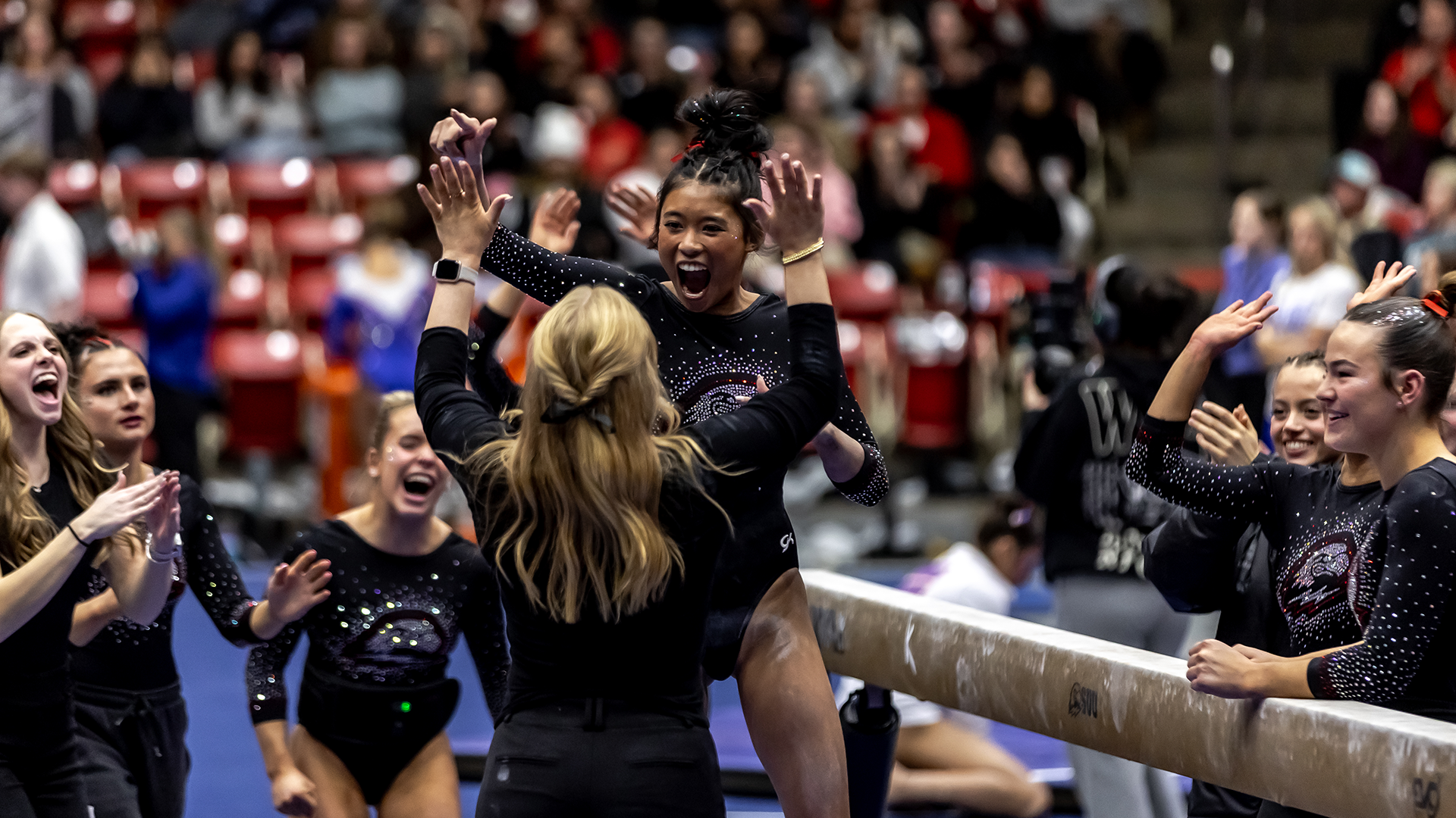 Mia Hampton Celebrates on the beam