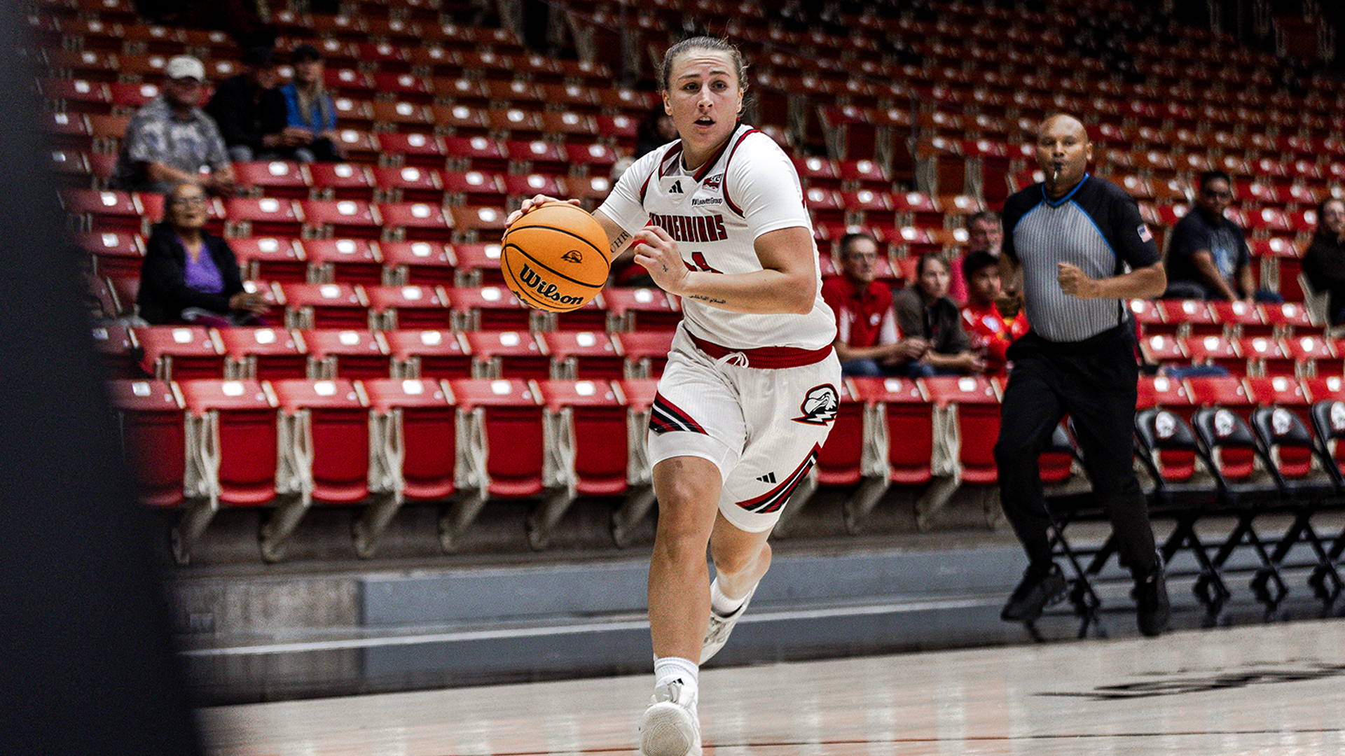Ava Uhrich dribbles up the court during scrimmage