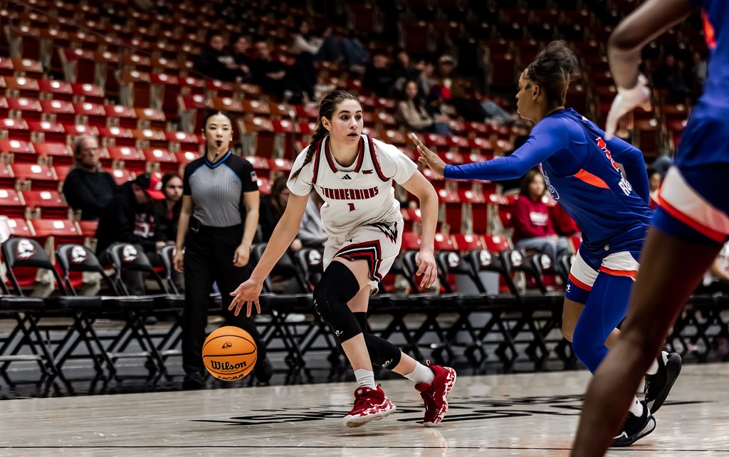 Kortney Doman dribbles