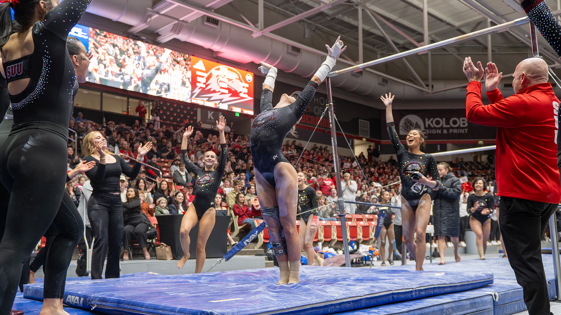 Kendall McGuire on the bars