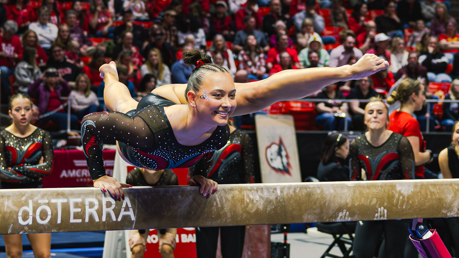 Emma Nipper on the beam at the start of her routine