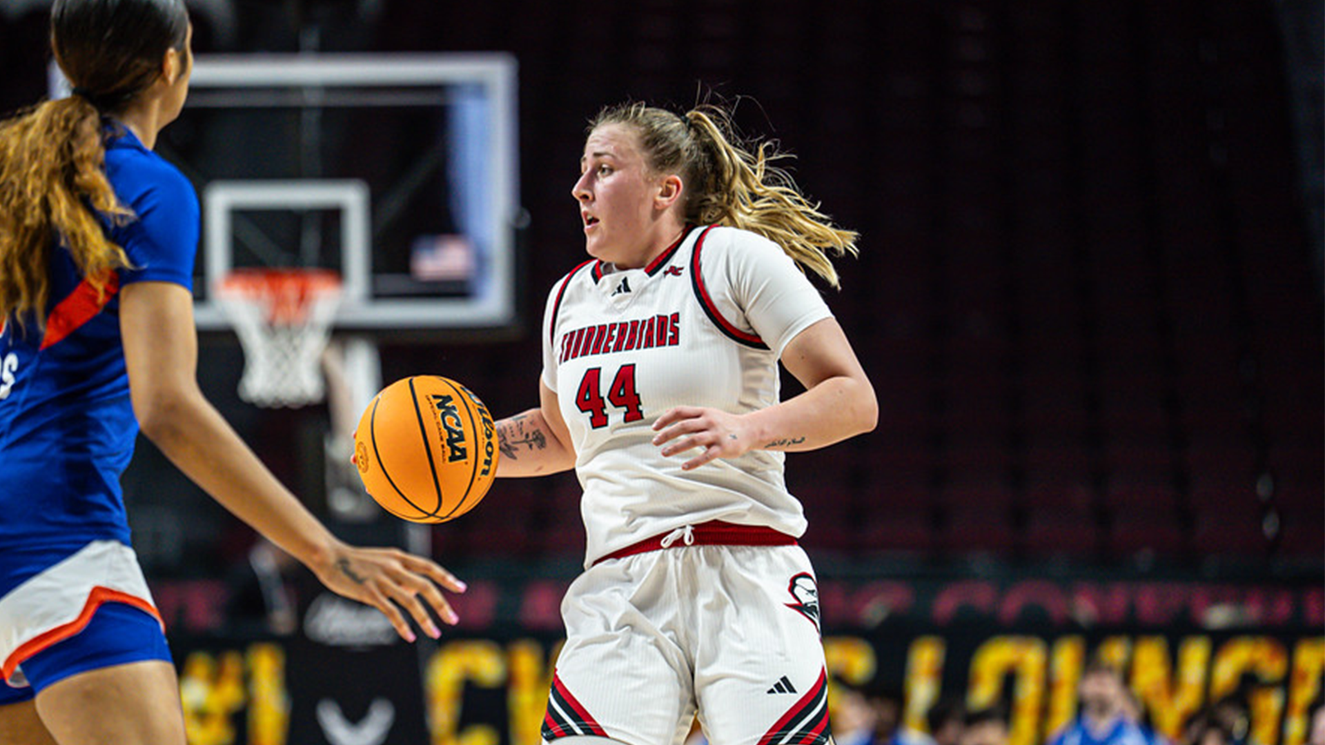 Ava Uhrich brings the ball up the court
