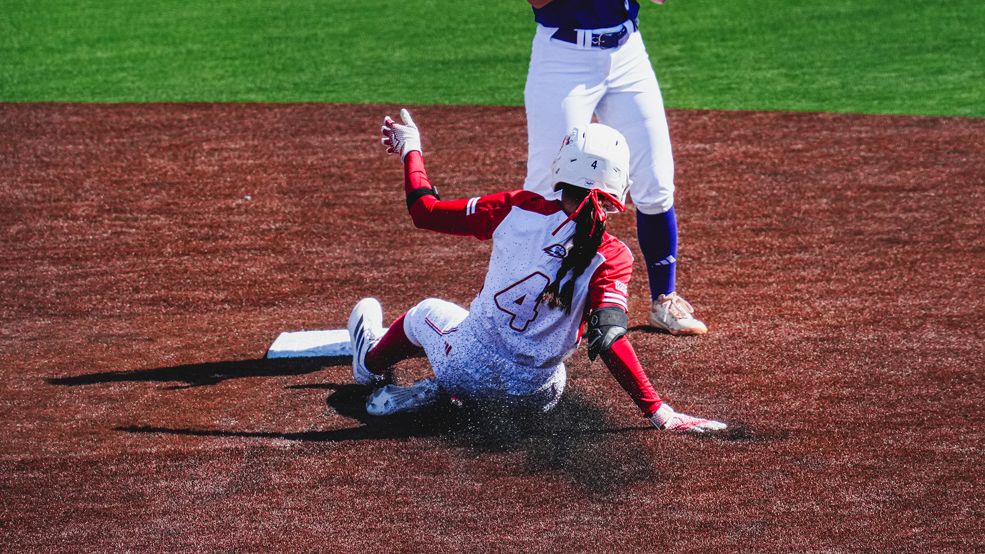 Michaella Salvatierra slids into second