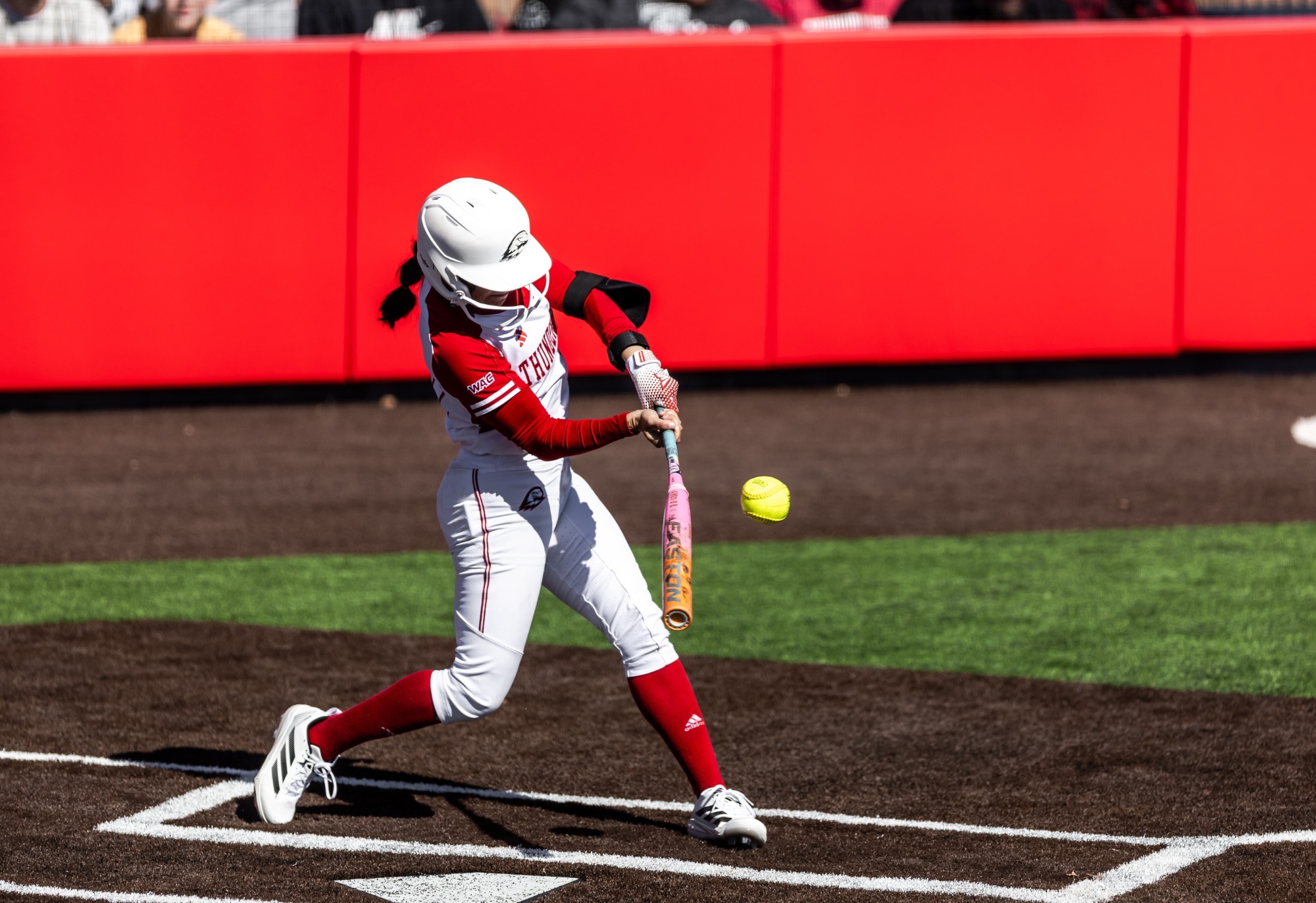 Alayah Toscano drive the ball on opening day.