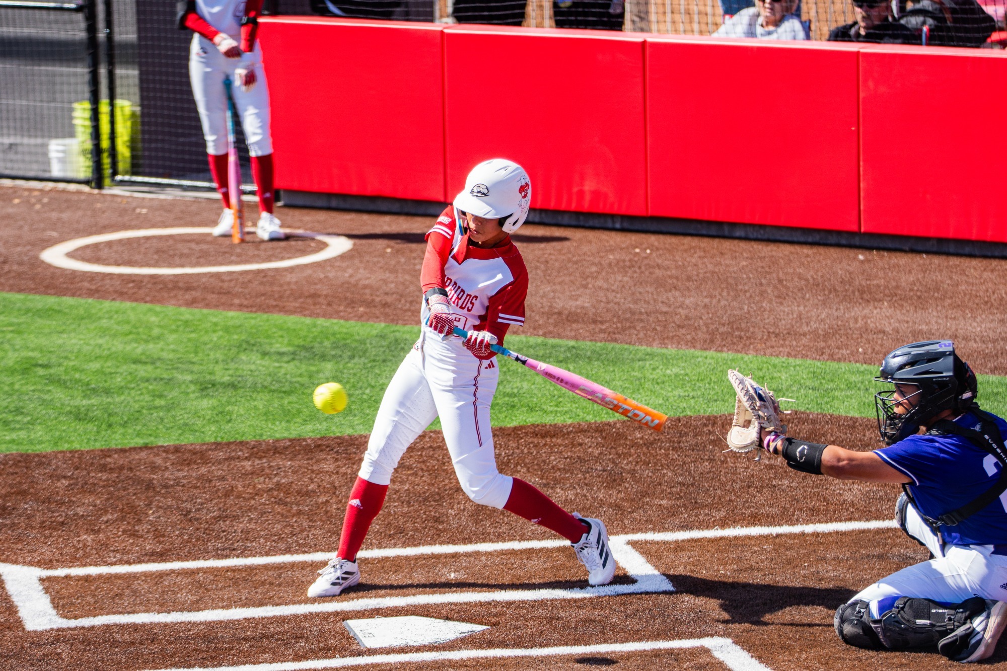 Ollison drives the ball