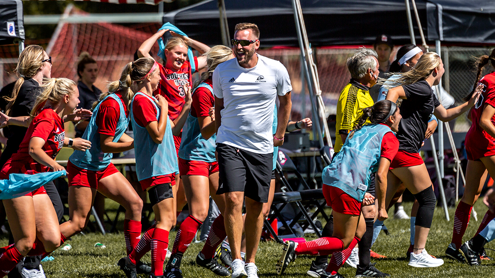 Coach Steven Lindquist Celebrating with the team