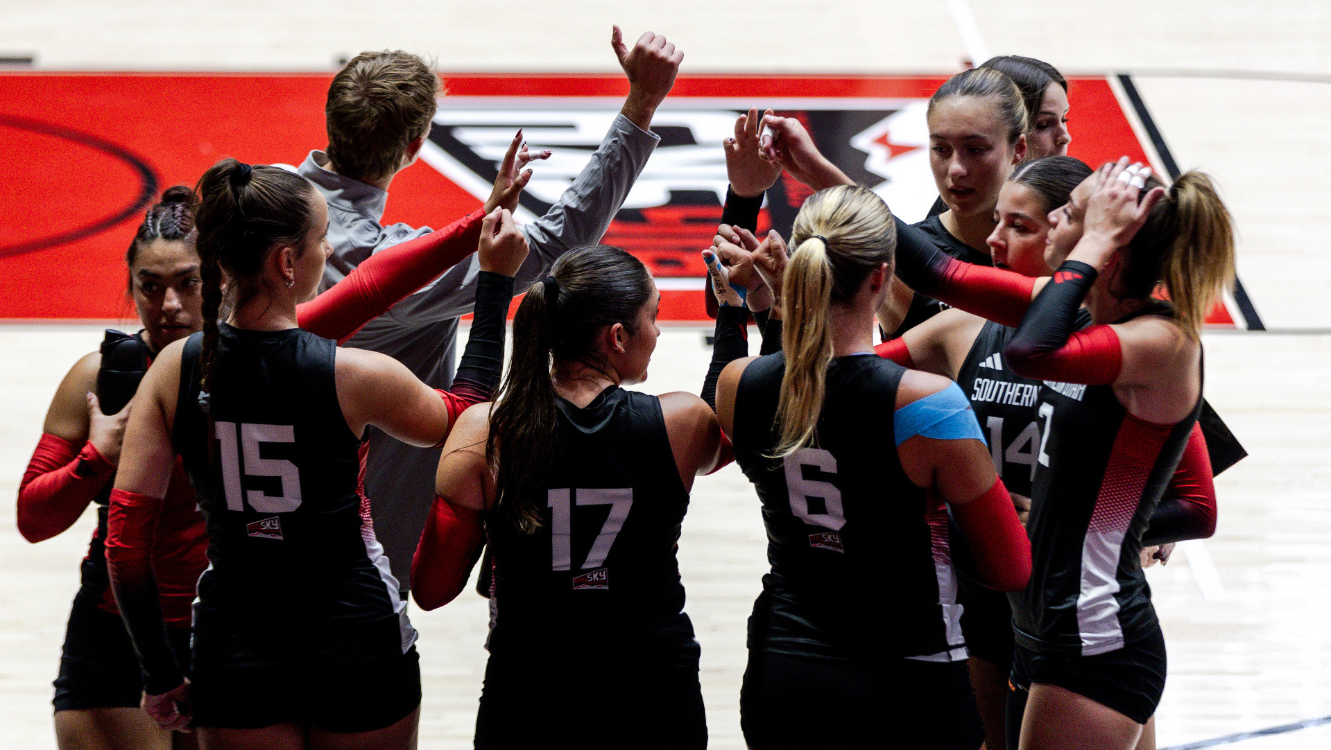 Black and Red Team Huddle