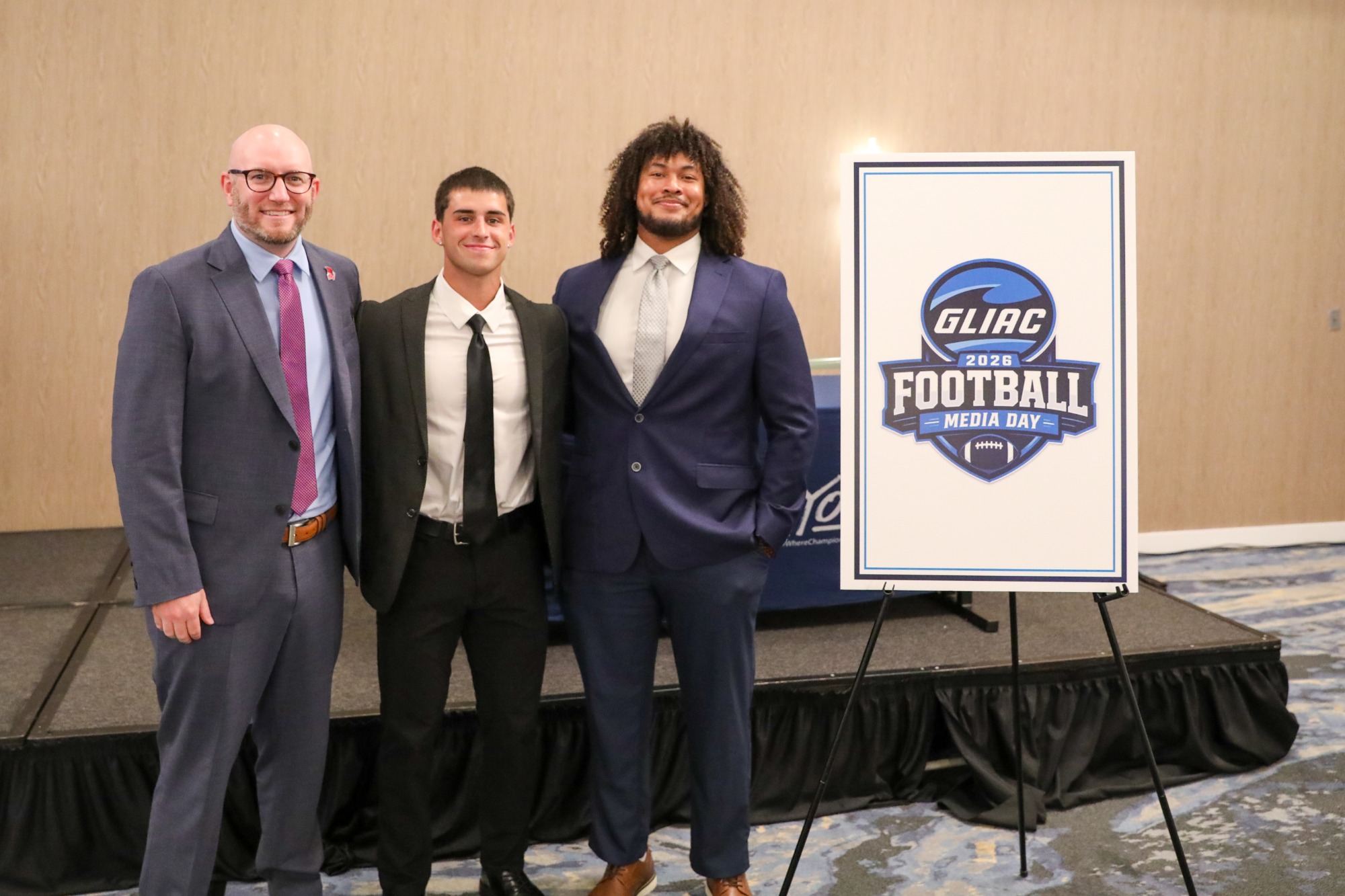 Coach Engle, Braden Hill, Adom LeDuc GLIAC FB Media Day