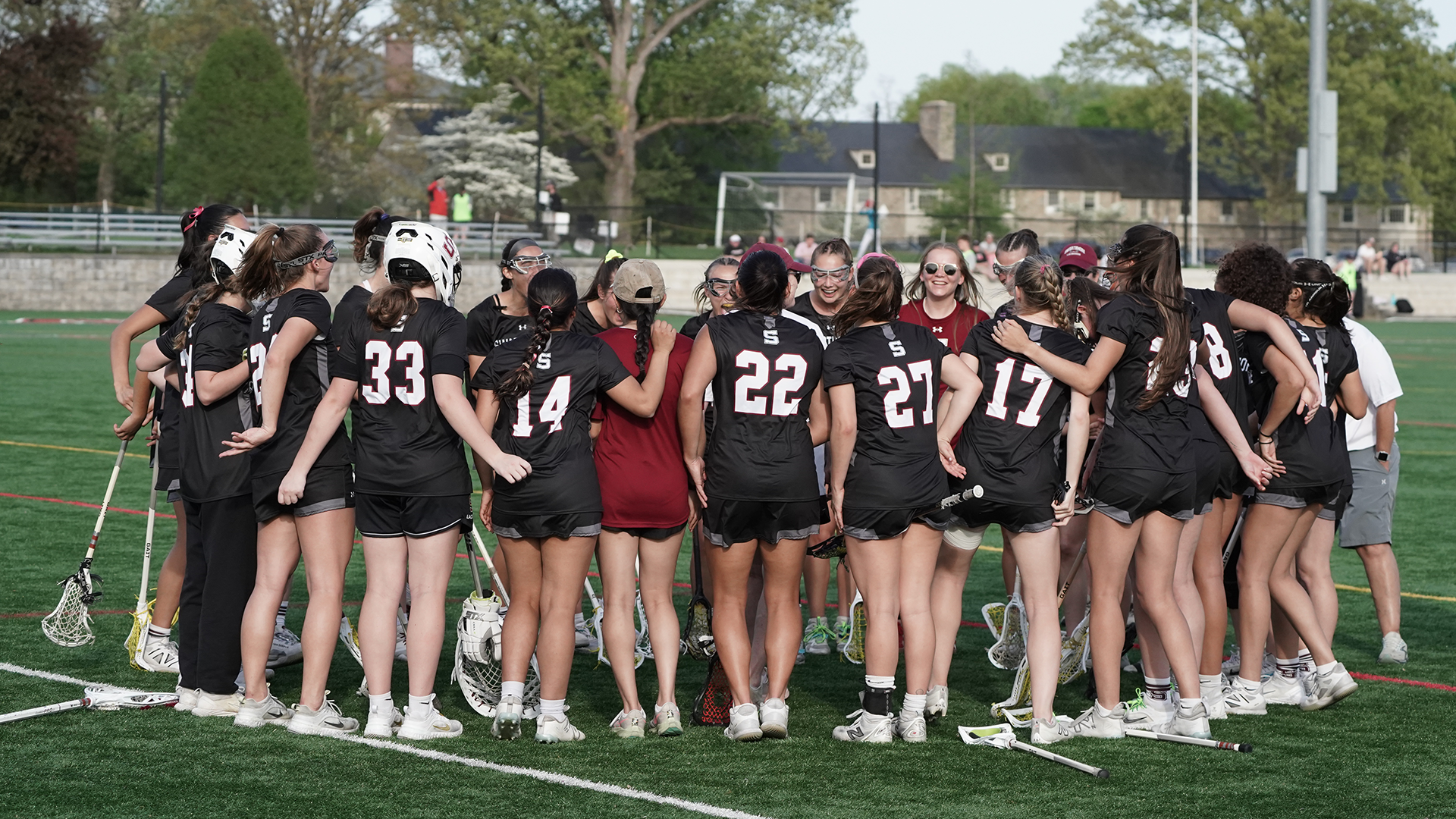 Women's lacrosse huddle