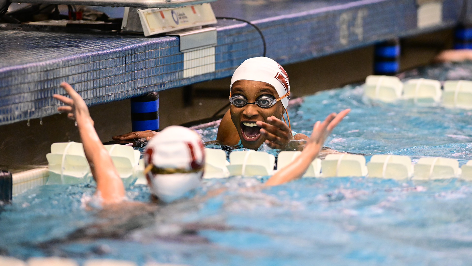 Collins celebrates centennial record with Anthony in the pool