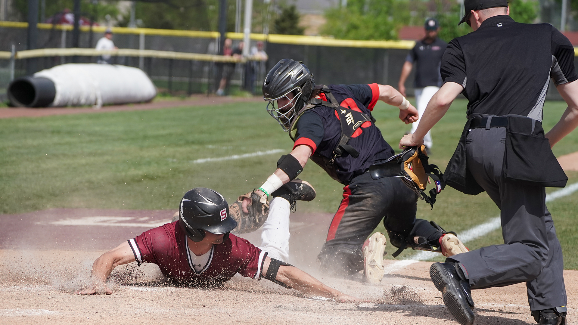 Johnston slides safely into home against Haverford