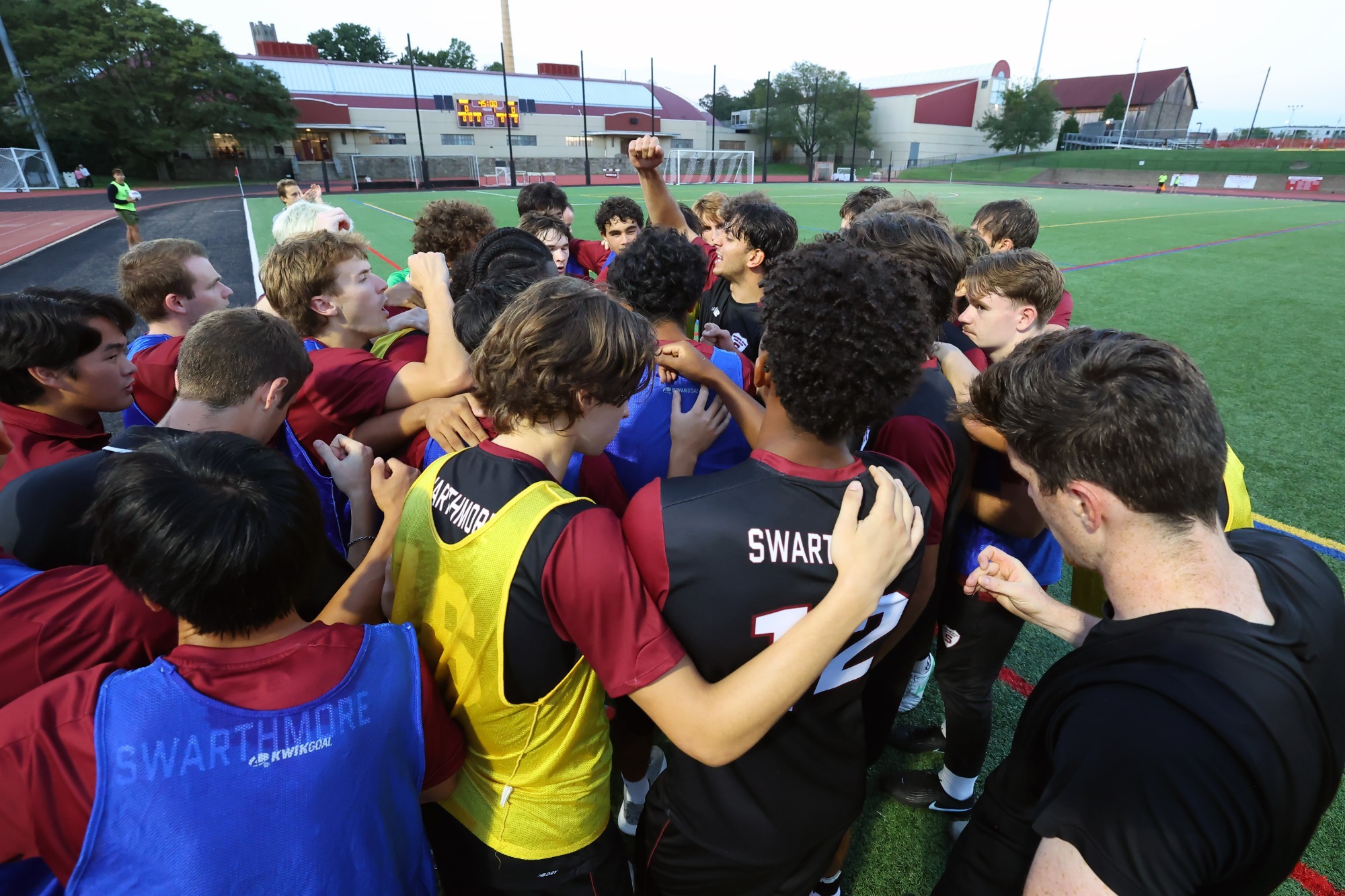 men's soccer pregame huddle