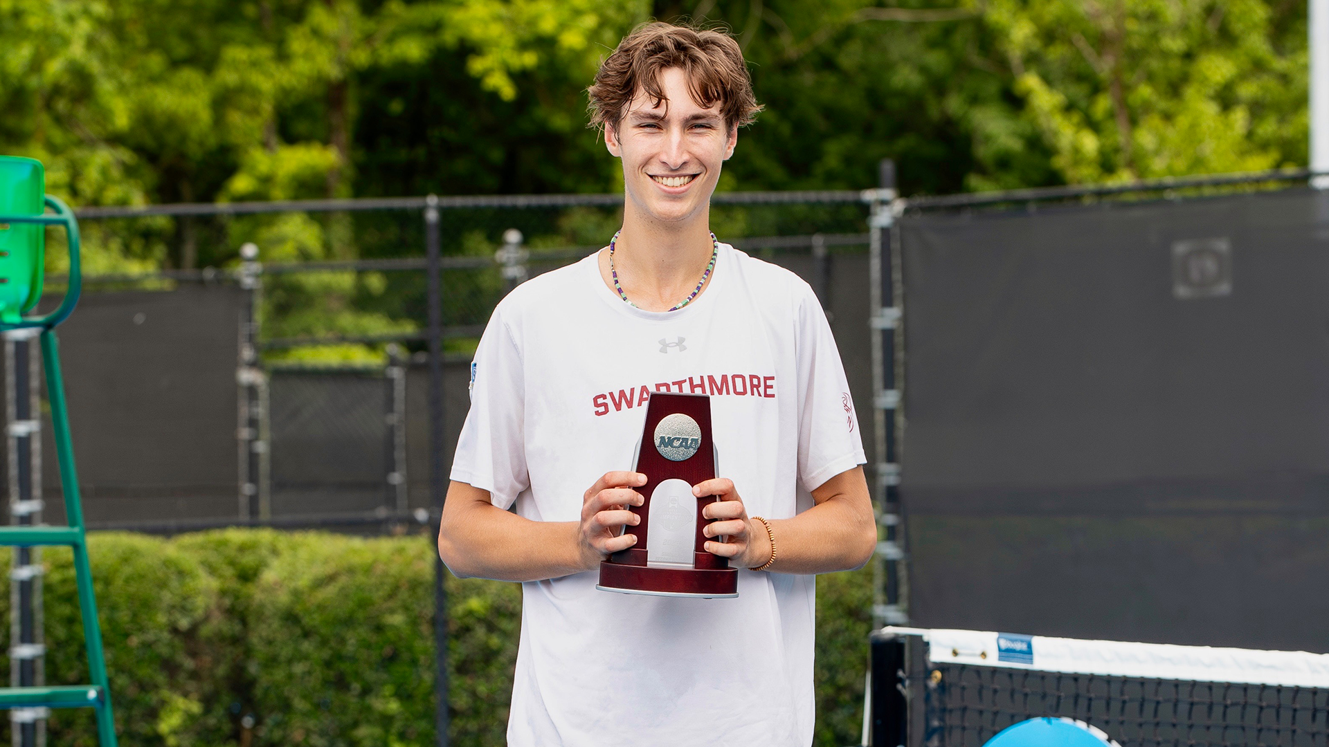 Melnikov poses with NCAA Runner-up Trophy