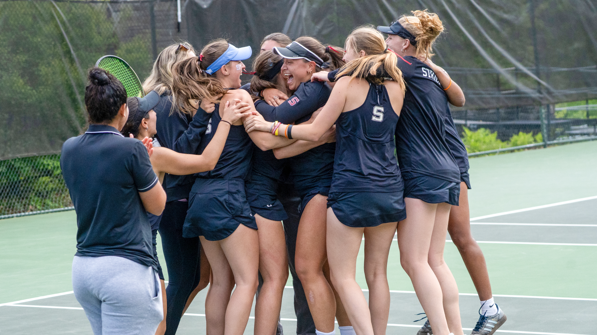 women's tennis celebrates winning centennial championship