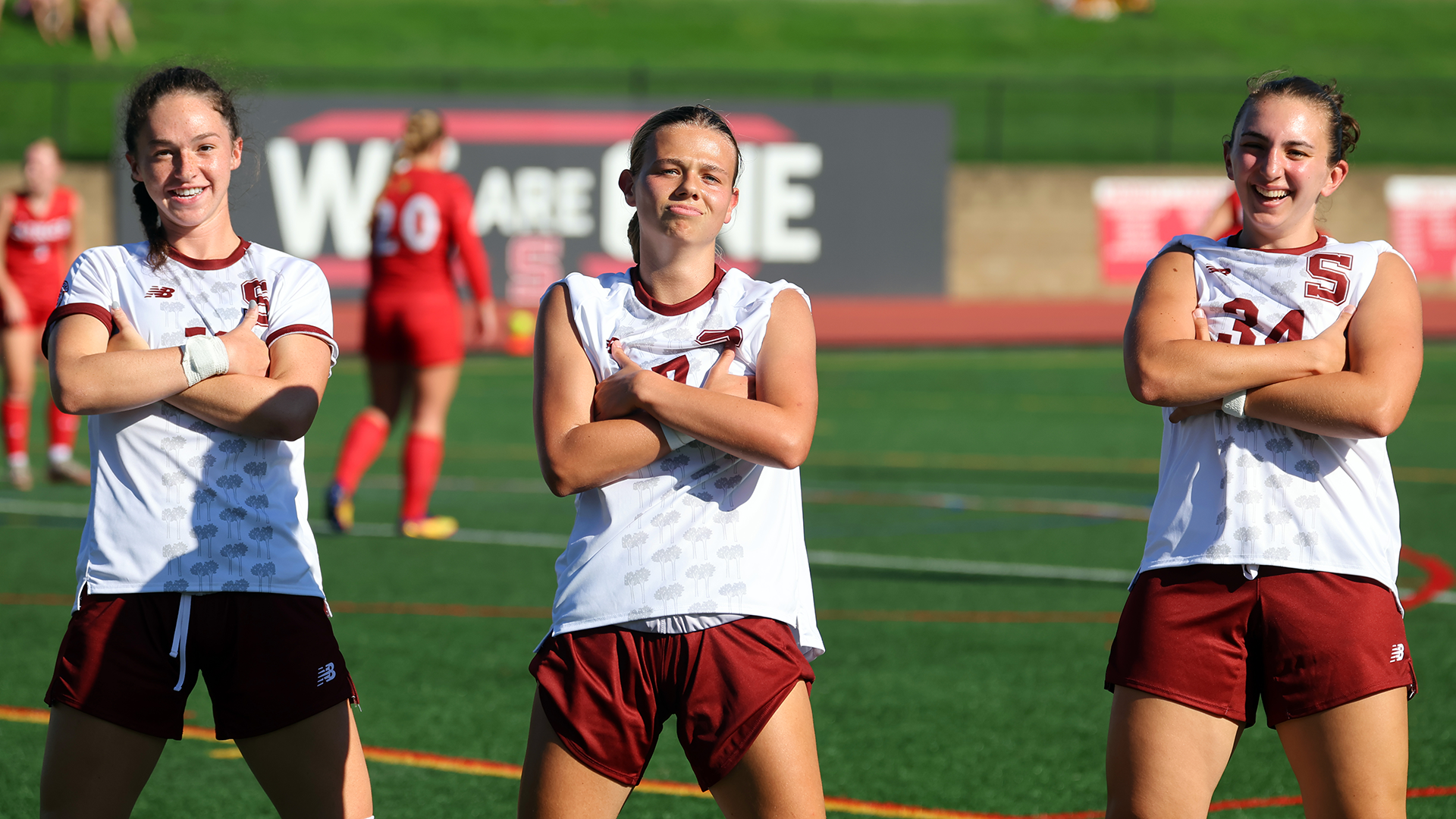 Reed celebrates goal with Carleton and Kanellakos
