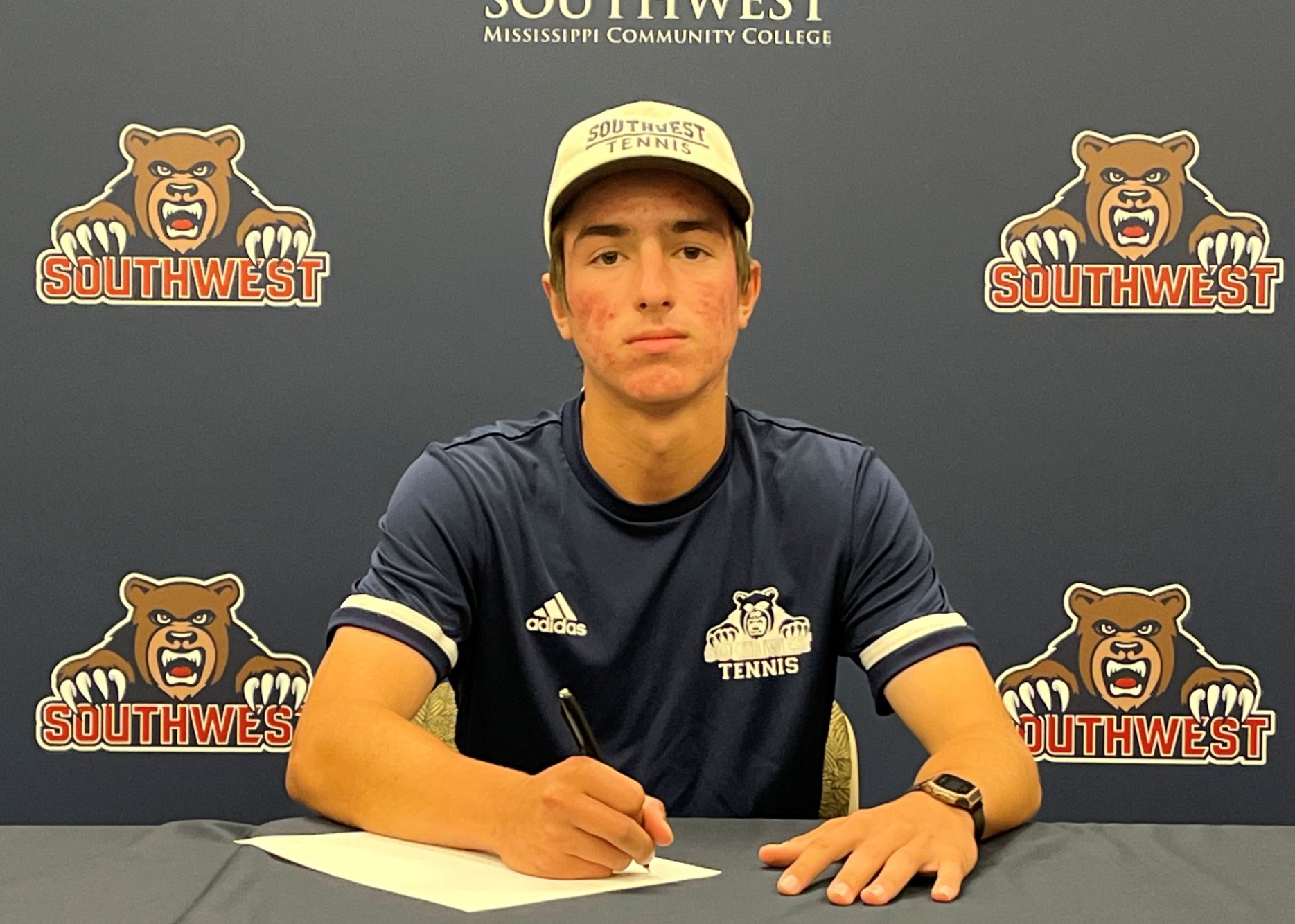 Mansur Khajimuradov signs