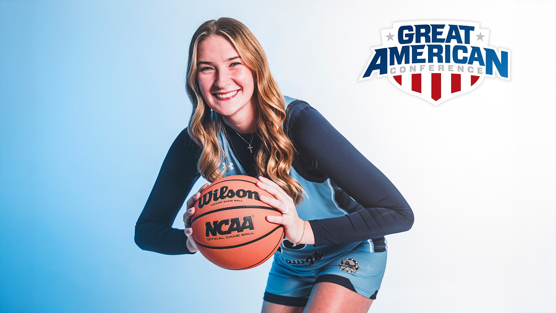 Landry Allen smiles with a basketball