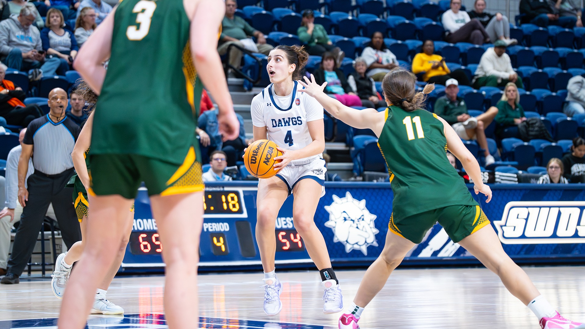 elle papahronis shoots a ball