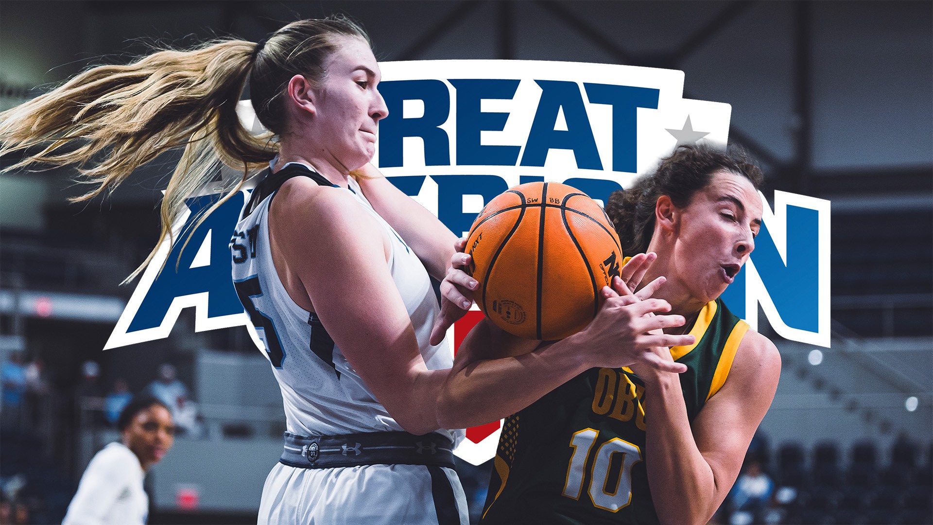 Landry Allen action shot playing defense in a game with a GAC logo behind her