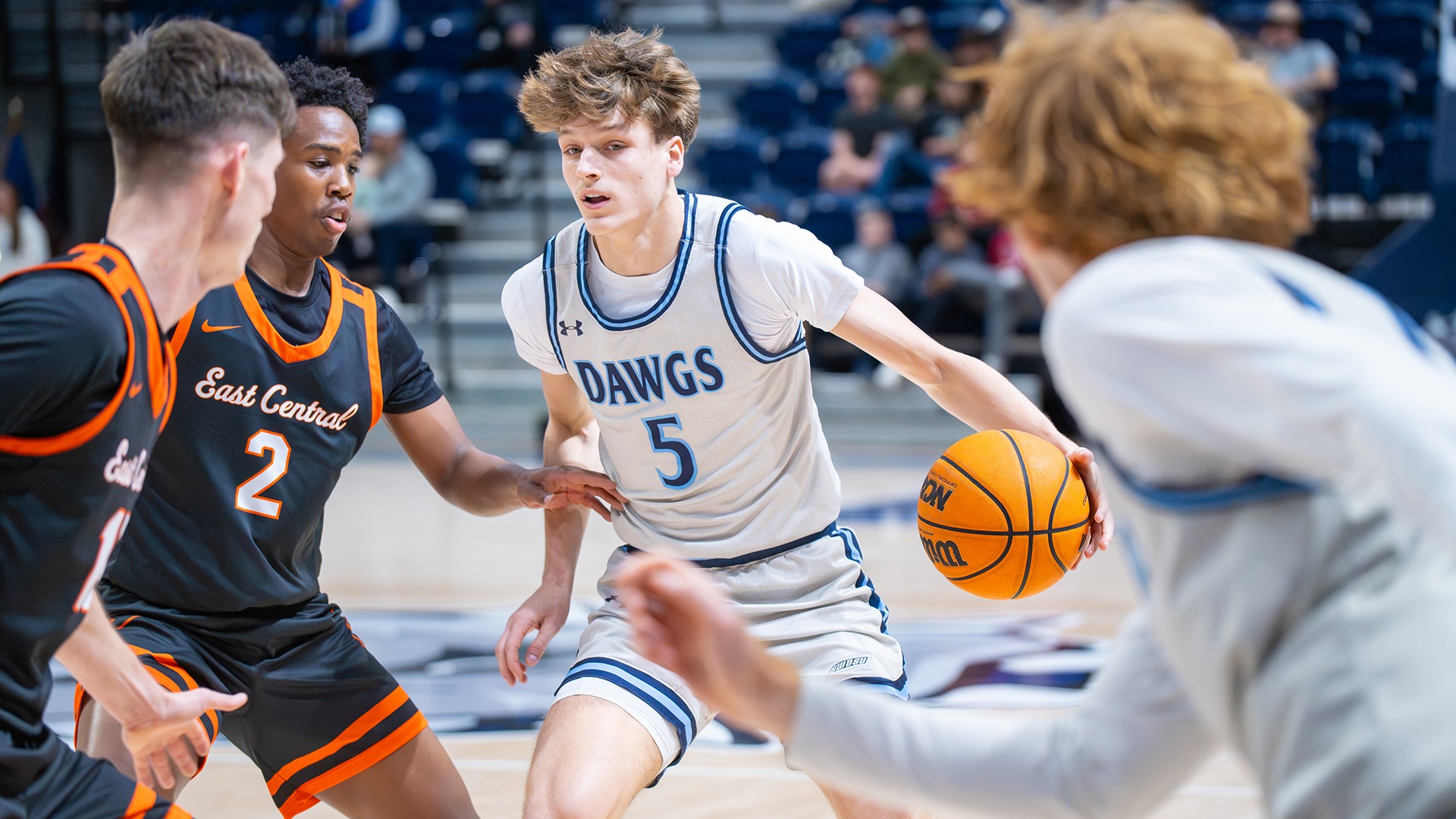 tucker shepherd has the ball against East Central