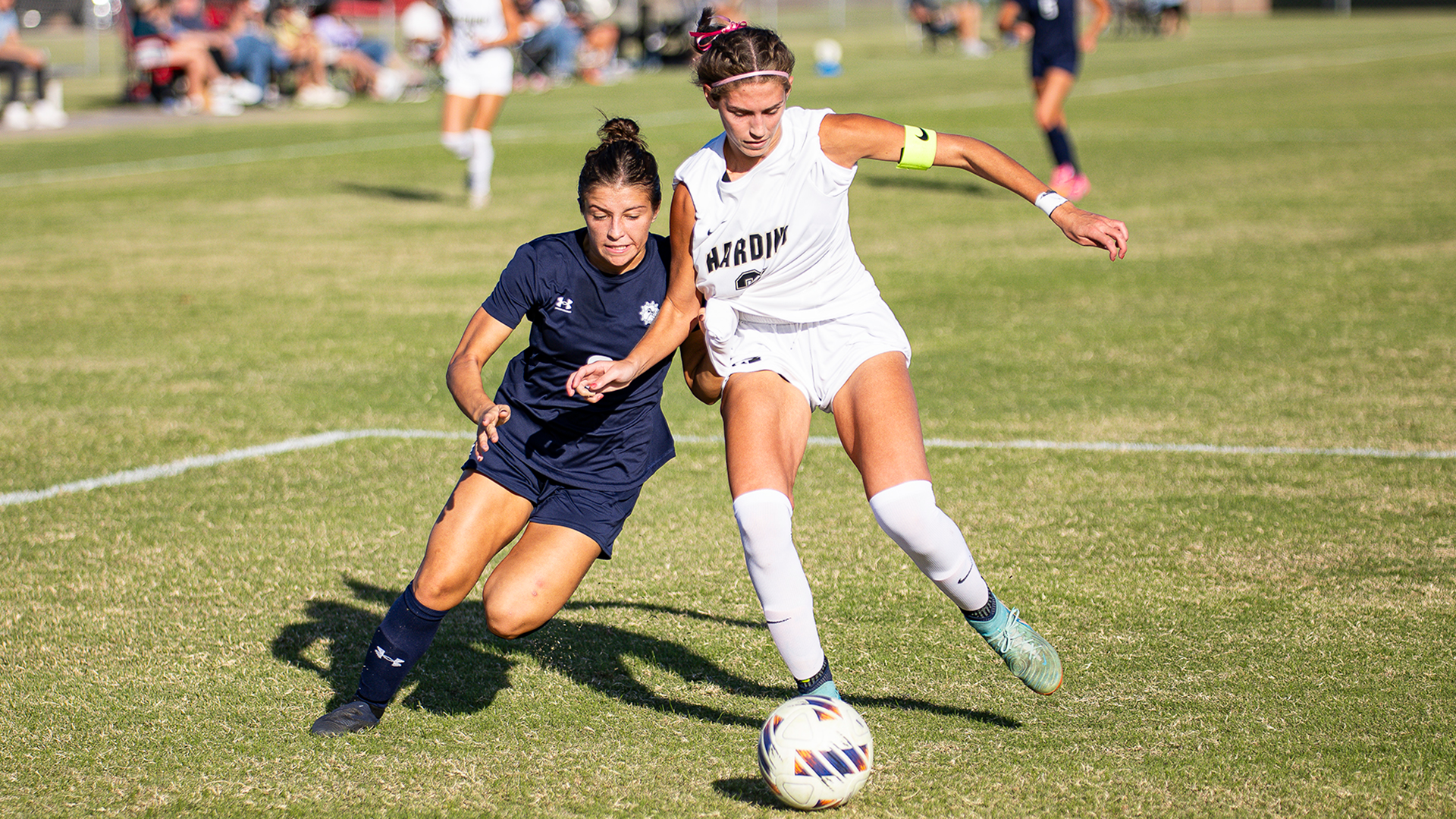 braelee epp battles for the ball against harding