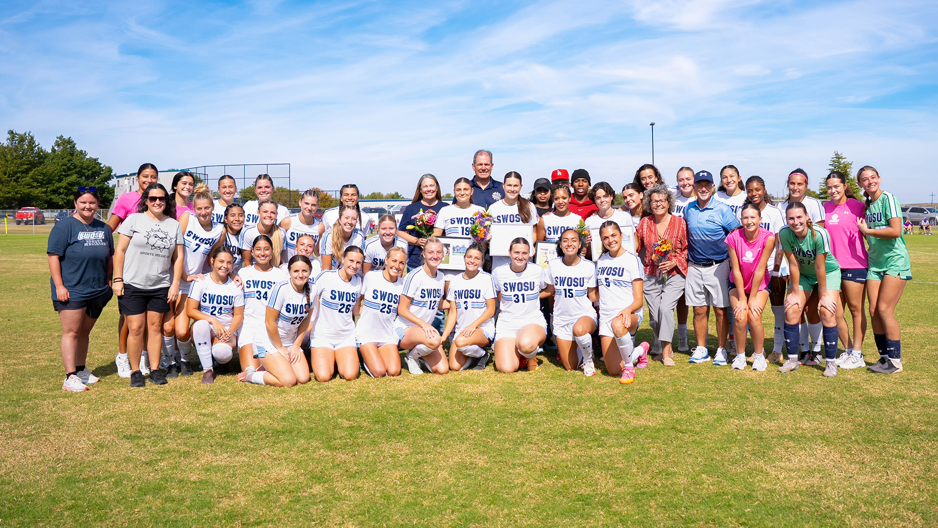 senior day group shot of swosu soccer during senior day pregame festivities