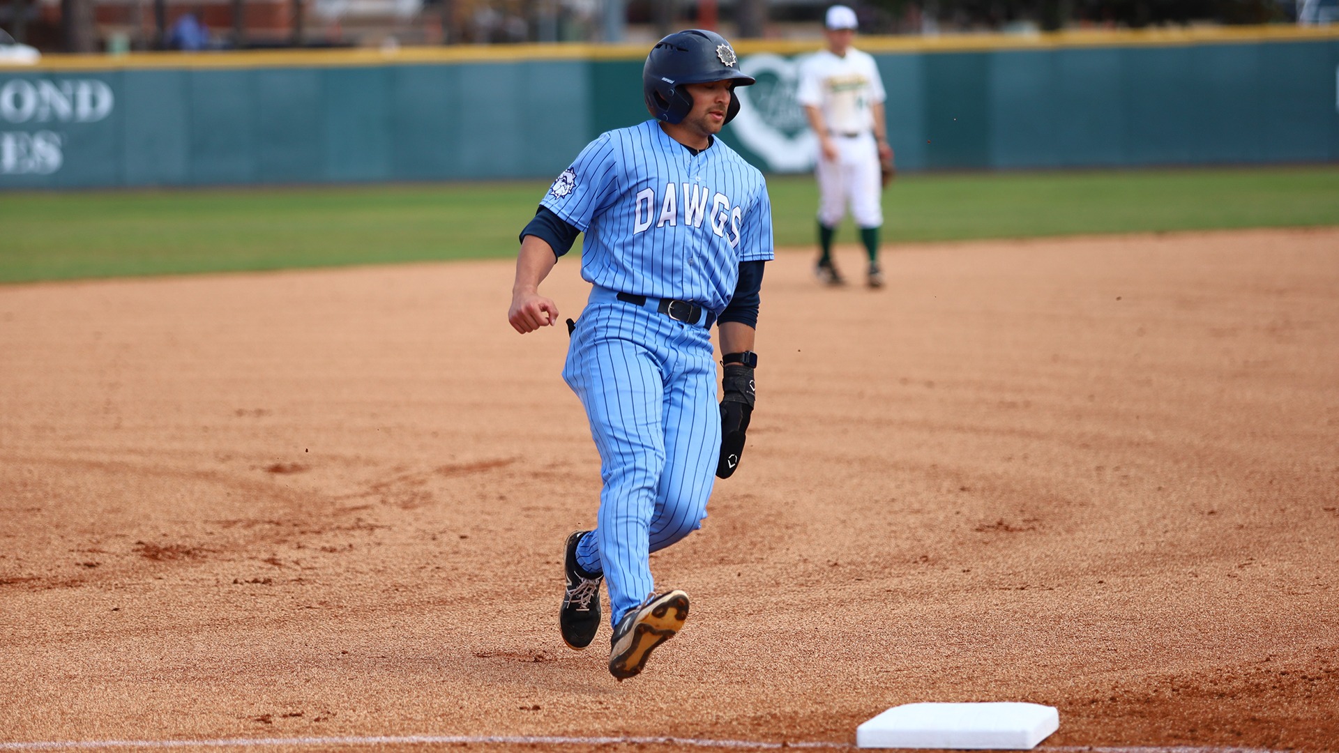 john spoto running the bases at Arkansas tech