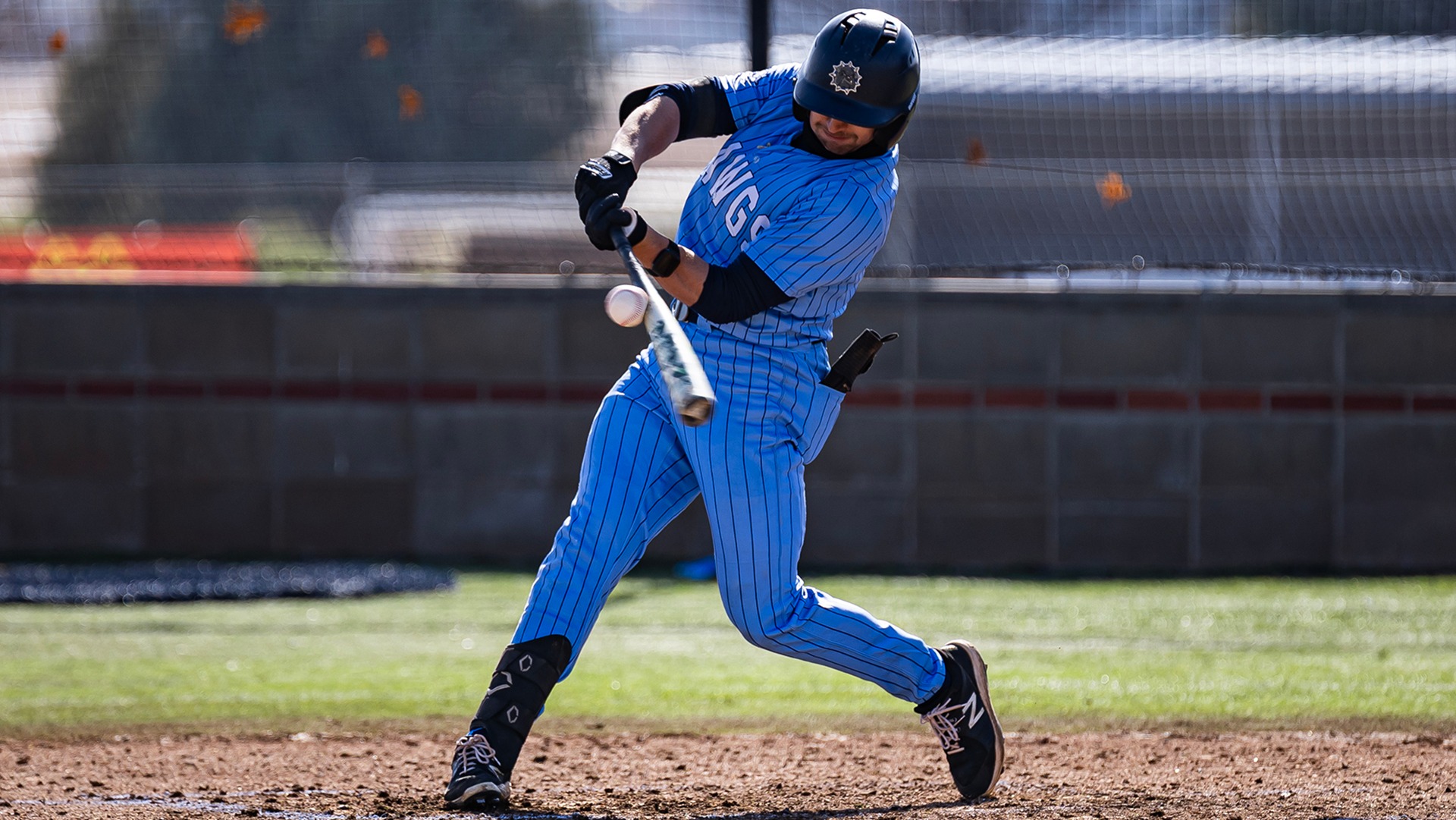 john spoto hits a ball against NW Missouri