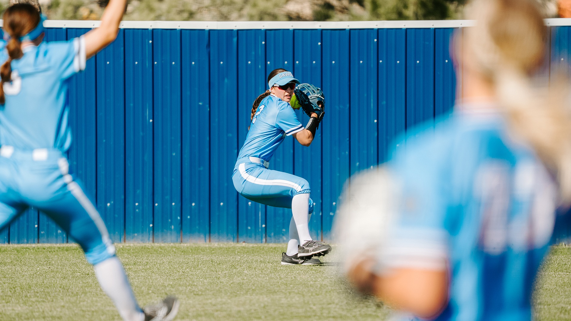 sierra woods throws a ball in from the outfield
