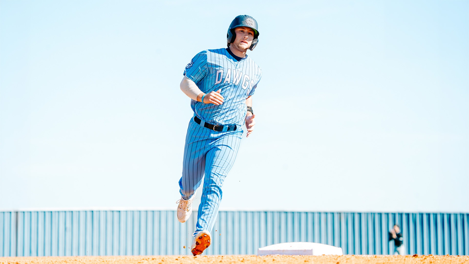 nolan mccrossin rounds the bases