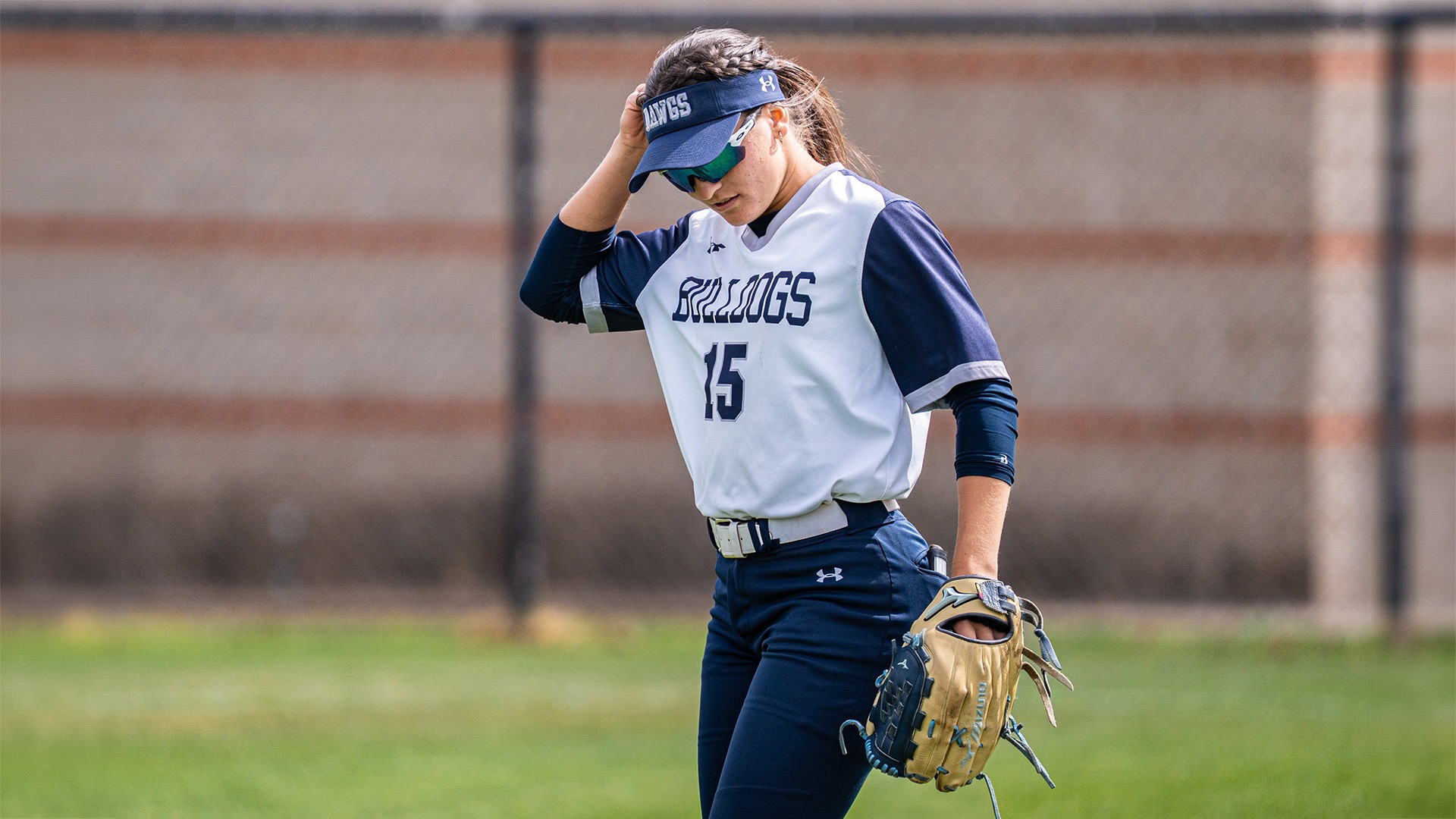 landry bayless adjusts her hat