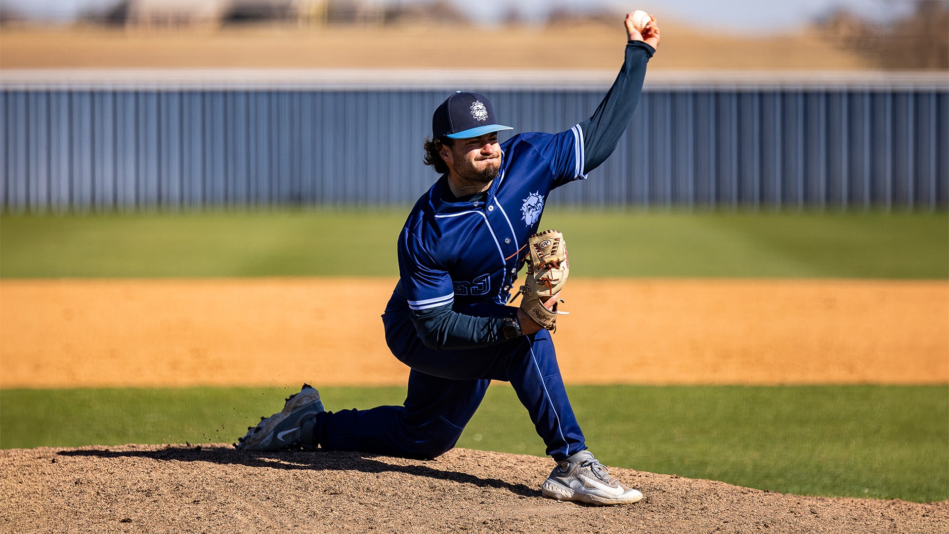 garrett folmar throws a pitch