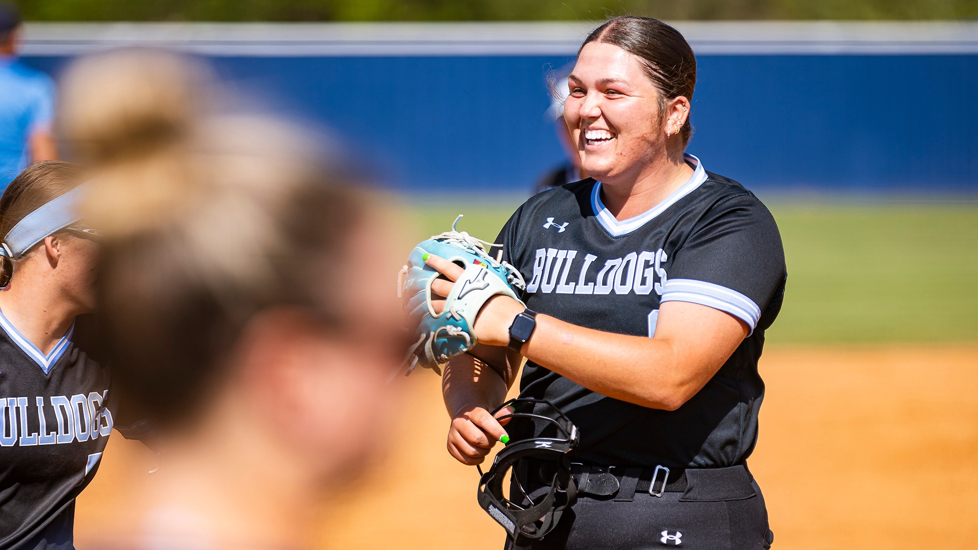 blaire gentry smiles after an inning in the circle